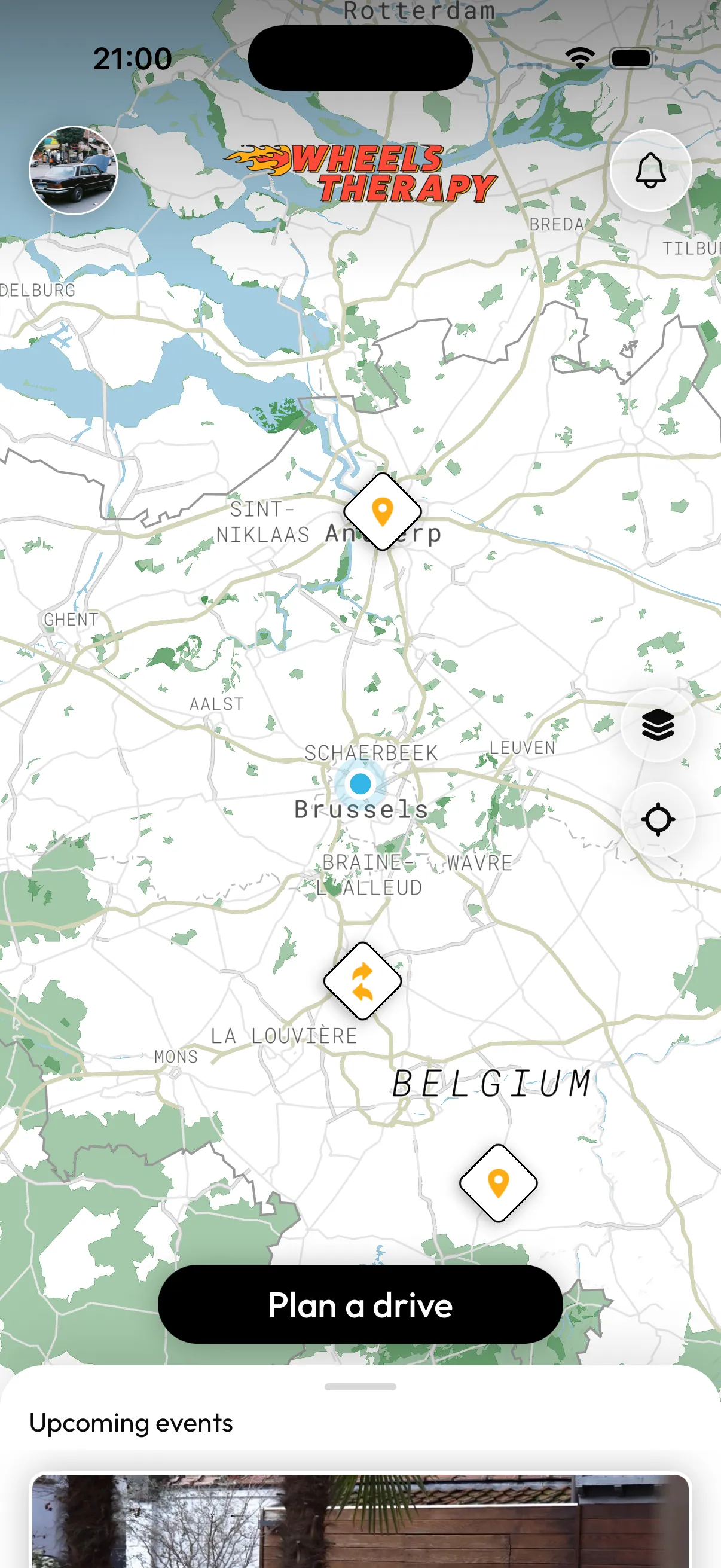 The Wheelstherapy map screen showing nearby drives and routes around Belgium with a Plan a drive button.